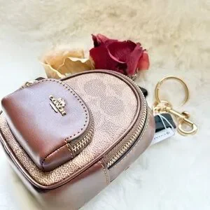 New with tags COACH Signature Mini Backpack BAG CHARM with outside zip pocket. s-l400.jpg main image 3